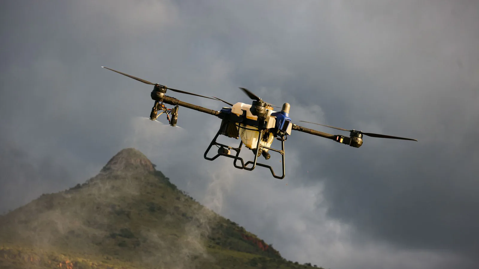 Drone flying above a mountainous landscape