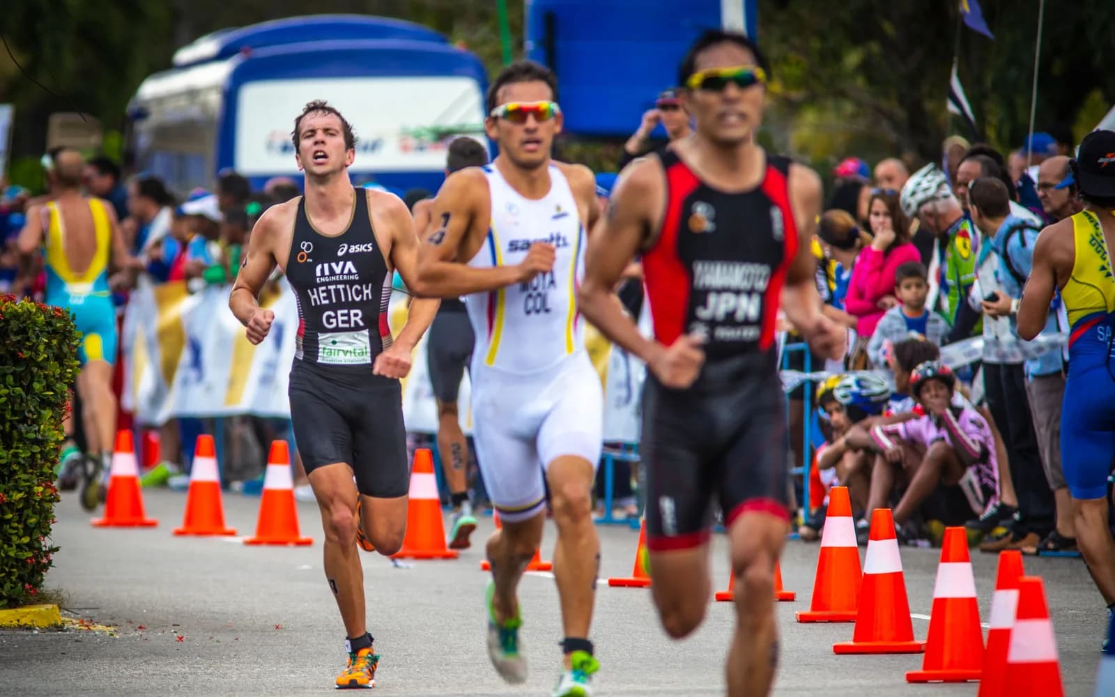 Athletes running in a stadium race